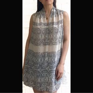 Woman’s size L CAbi high-low tank blouse. PERFECT CONDITION! ORIGINALLY $89